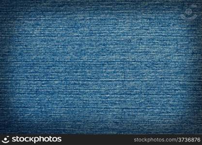 Rough denim blue background with dark contour