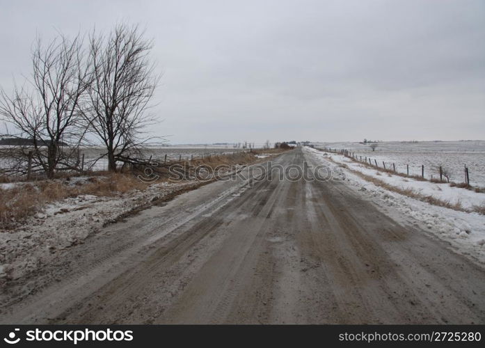 Rough road in winter, Homestead, Iowa