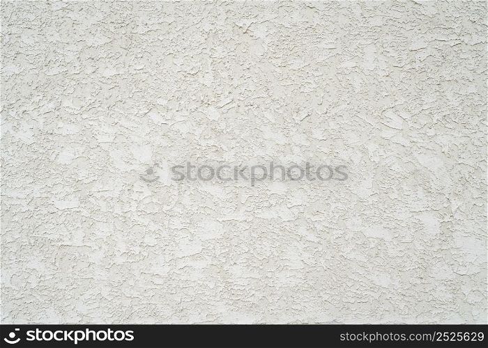 rough stucco texture background on an exterior building wall