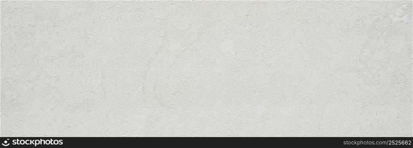 rough stucco texture background on an exterior building wall, panoramic web banner