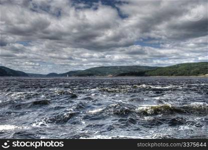 Rough water of Saint Lawrence River in a August afternoon