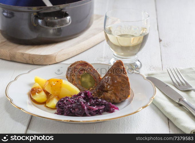 Roulade of beef with potatoes and red cabbage.. Roulade of beef with potatoes and red cabbage