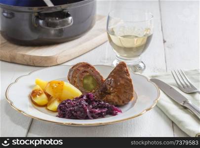 Roulade of beef with potatoes and red cabbage.. Roulade of beef with potatoes and red cabbage