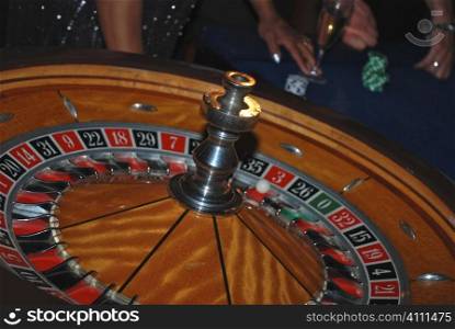 Roulette wheel at black tie event