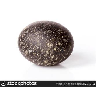 Round black stone isolated on white background