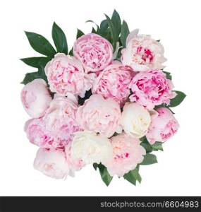 Round bouquet of fresh peony flowers with leaves colored in shades of pink isolated on white background, top view. Fresh peony flowers