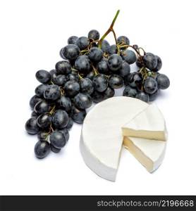 Round brie or camambert cheese and grapes isolated on a white background. Round brie or camambert cheese and grapes on a white background