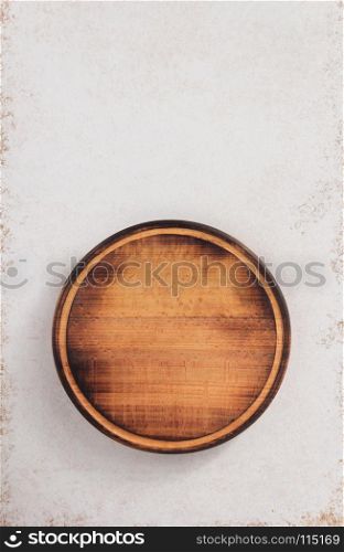 round cutting board at abstract surface background texture