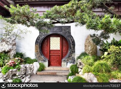 Round doorway in ancient Yu Yuan Garden in Shanghai, China