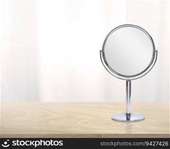 Round mirror on wooden table