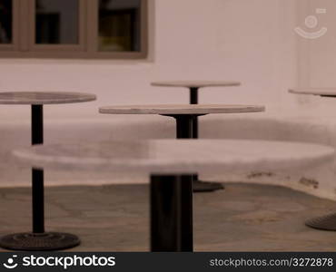 Round tables in Mykonos Greece