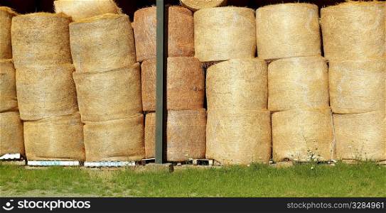 round wheat bales stacked stock rows golden dried circle shape