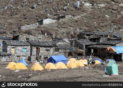 Rourist tents near houses in Samdo, Nepal