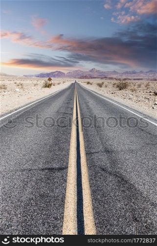Route 66 in the desert with scenic sky. Classic vintage image with nobody.
