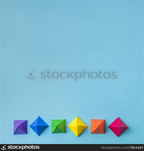 row bright paper origami. High resolution photo. row bright paper origami. High quality photo