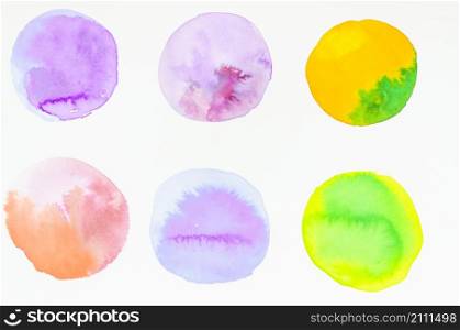 row hand painted watercolor circles design isolated white