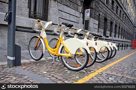 Row of bicycles for rent in Milano, Italy