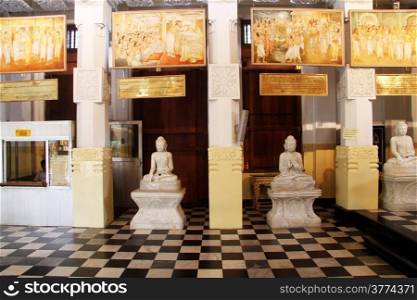 Row of Buddhas inside Tooth temple in Kandy, Sri Lanka