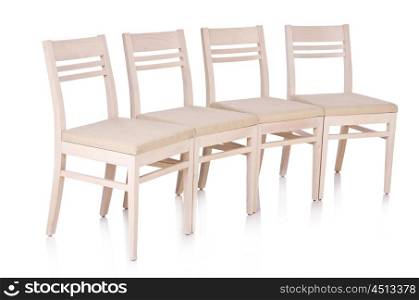 Row of chairs isolated on the white
