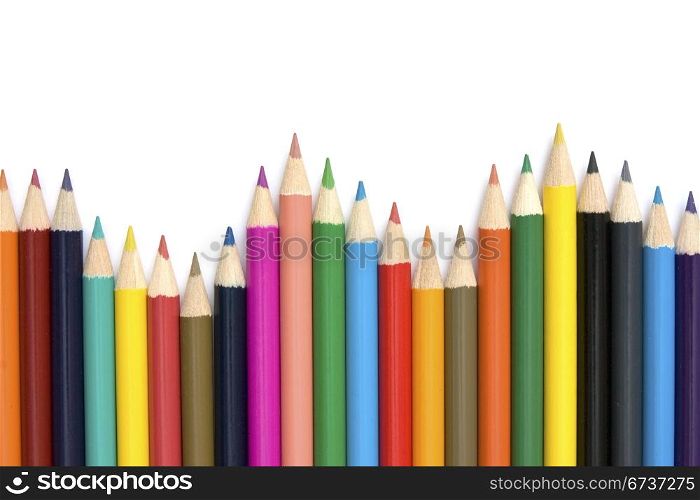 row of colorful pencils with copy space