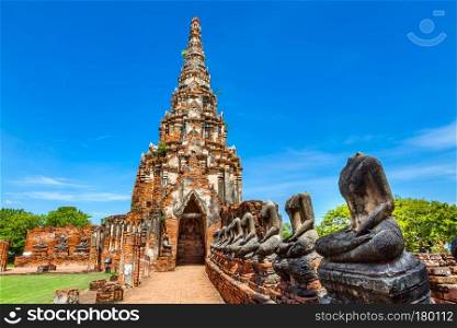 Row of Decapitated Buddha Image in Wat Chai Wattanaram in Ayutthaya Thailand