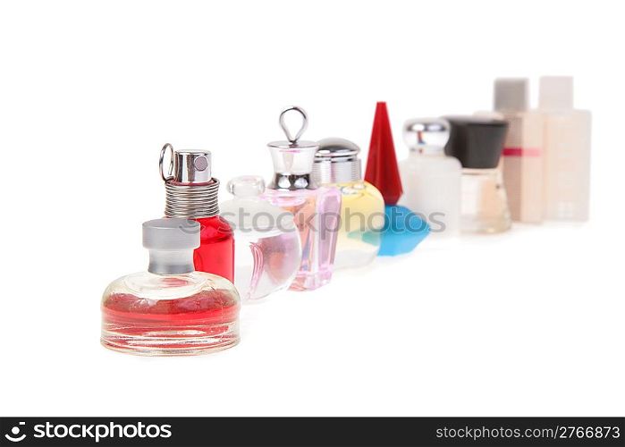 row of flasks with perfume