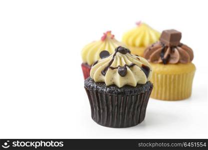 row of four cupcake on white background