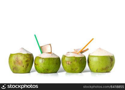row of fresh coconut on white background