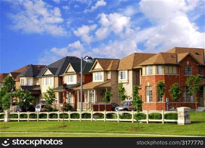 Row of new residential houses in suburban neighborhood