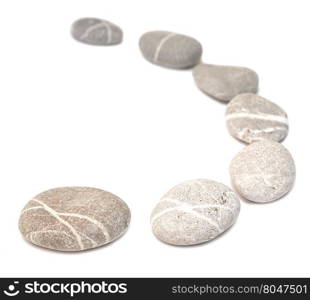 row of pebbles isolated on white background