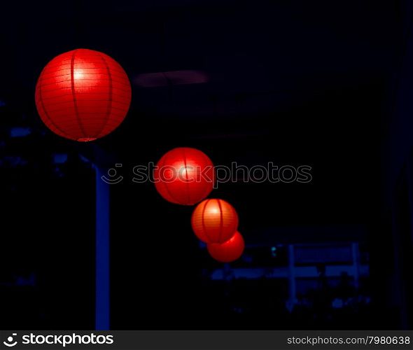 Row of red Chinese lanterns hanging