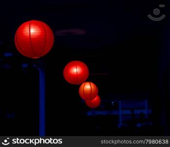 Row of red Chinese lanterns hanging
