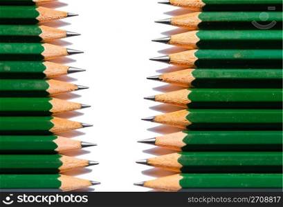 Row of single colored pencils isolated on white background