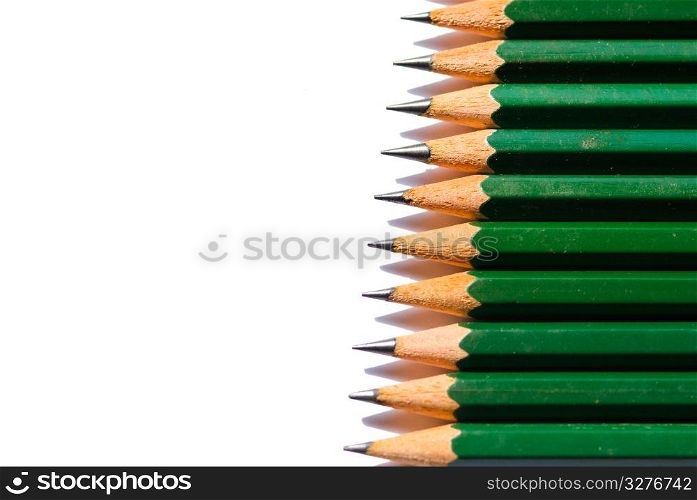 Row of single colored pencils isolated on white background