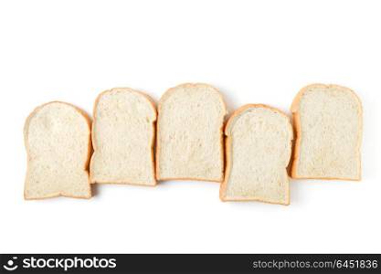 row of sliced bread on white background