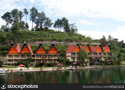 Row of traditional batak houses on the Samosir island, Indonesia