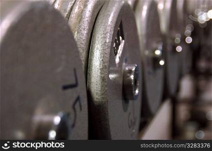 Row of weights in fitness club.