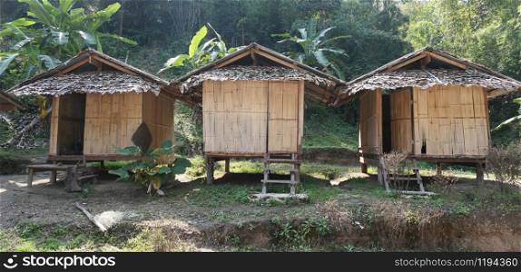 Row of wooden bamboo houses