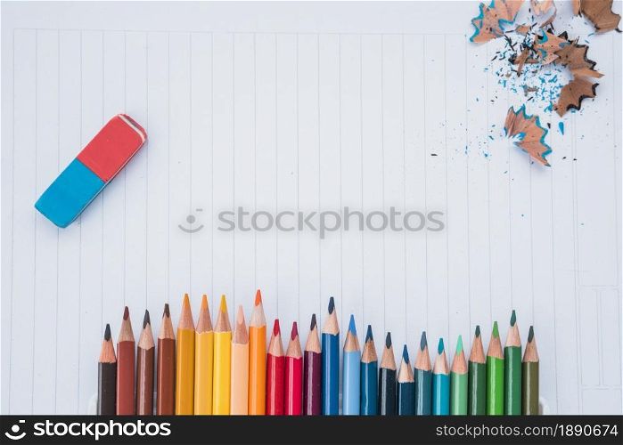 row pencil colors with eraser pencil shaving white paper . Resolution and high quality beautiful photo. row pencil colors with eraser pencil shaving white paper . High quality and resolution beautiful photo concept