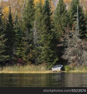 Rowboat at the lakeside, Kenora, Lake of The Woods, Ontario, Canada