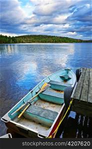 Rowboat docked on Lake of Two Rivers in Algonquin Park, Ontario, Canada