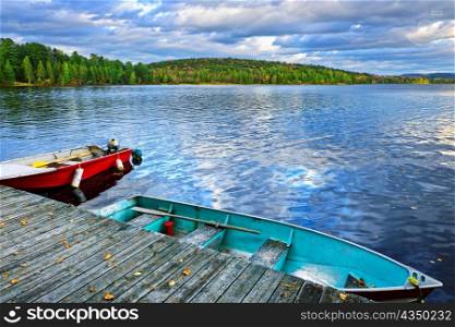Rowboats docked on Lake of Two Rivers in Algonquin Park, Ontario, Canada