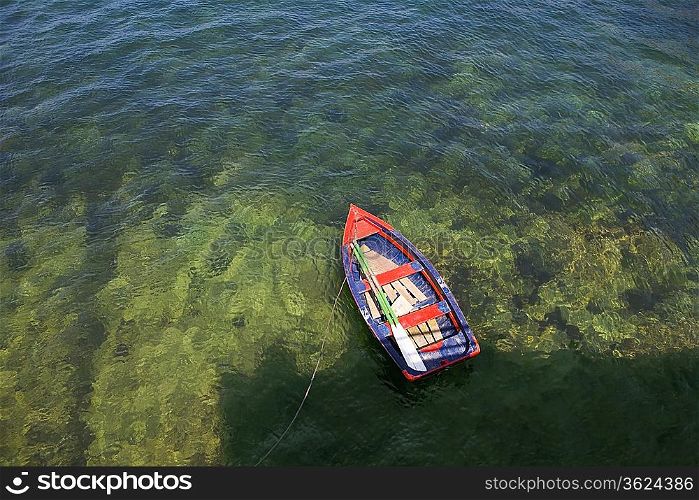 Rowing boat in shallow water Asurias Spain