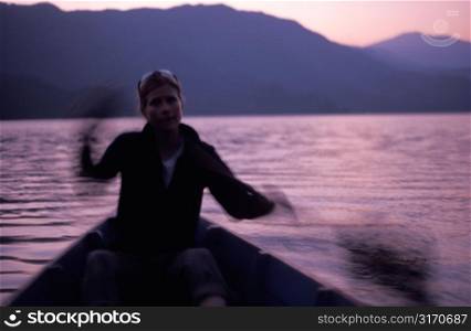 Rowing on Purple Water
