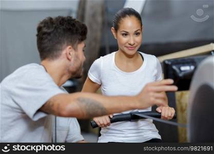 rowing workout with personal trainer