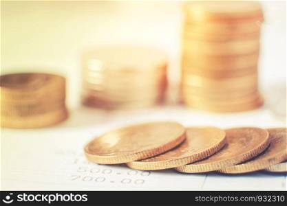 Rows of coins for finance and banking on digital stock market financial concept