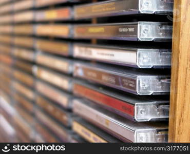 Rows of music cds in a cd holder, shallow dof