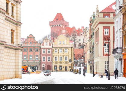 Royal Castle and Old Market square in Old Town of Poznan in the snowy winter day, Poznan, Poland. Old Town of Poznan, Poland