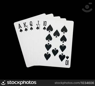 Royal flush,chips cards on black background