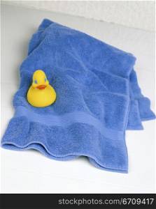 Rubber duck on a towel